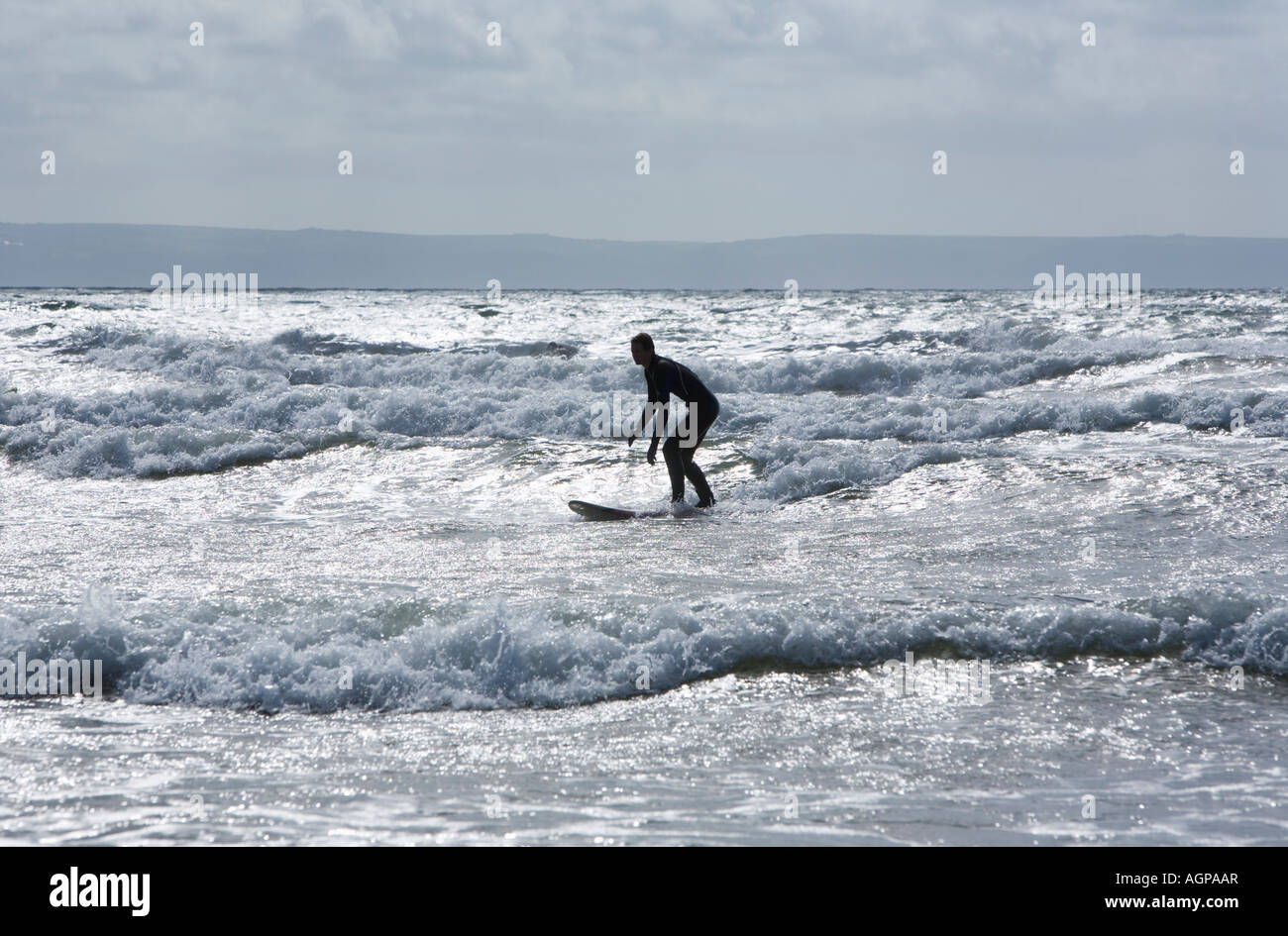 Surfer a Croyde Bay Devon England Foto Stock