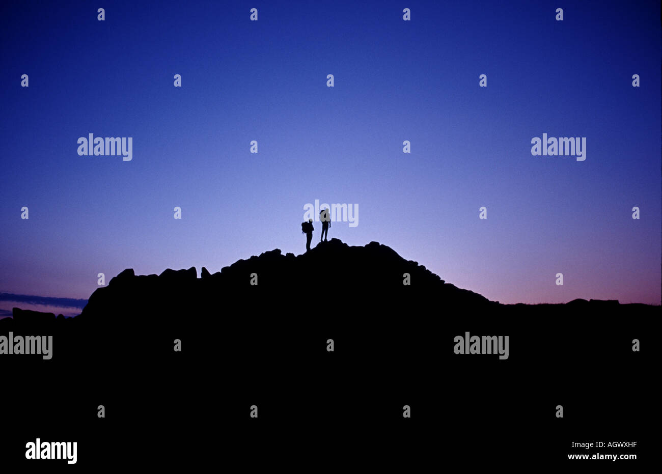 Summiting Slieve Bearnagh, montagne di Mourne Foto Stock