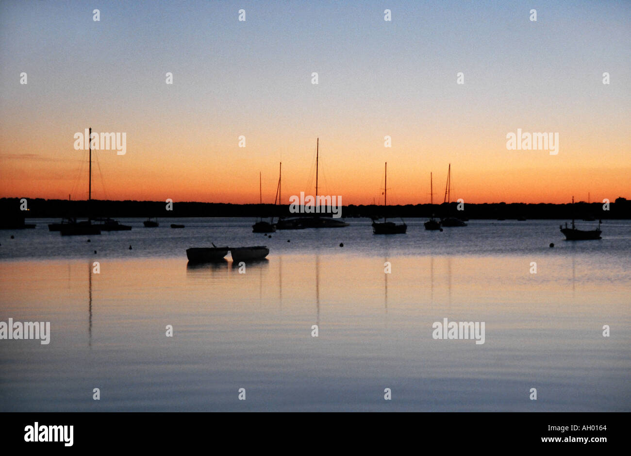 Formentera sunset Balaeric Isole Canarie Spagna europa lago barche della laguna calma placida ancora idilliaco Foto Stock
