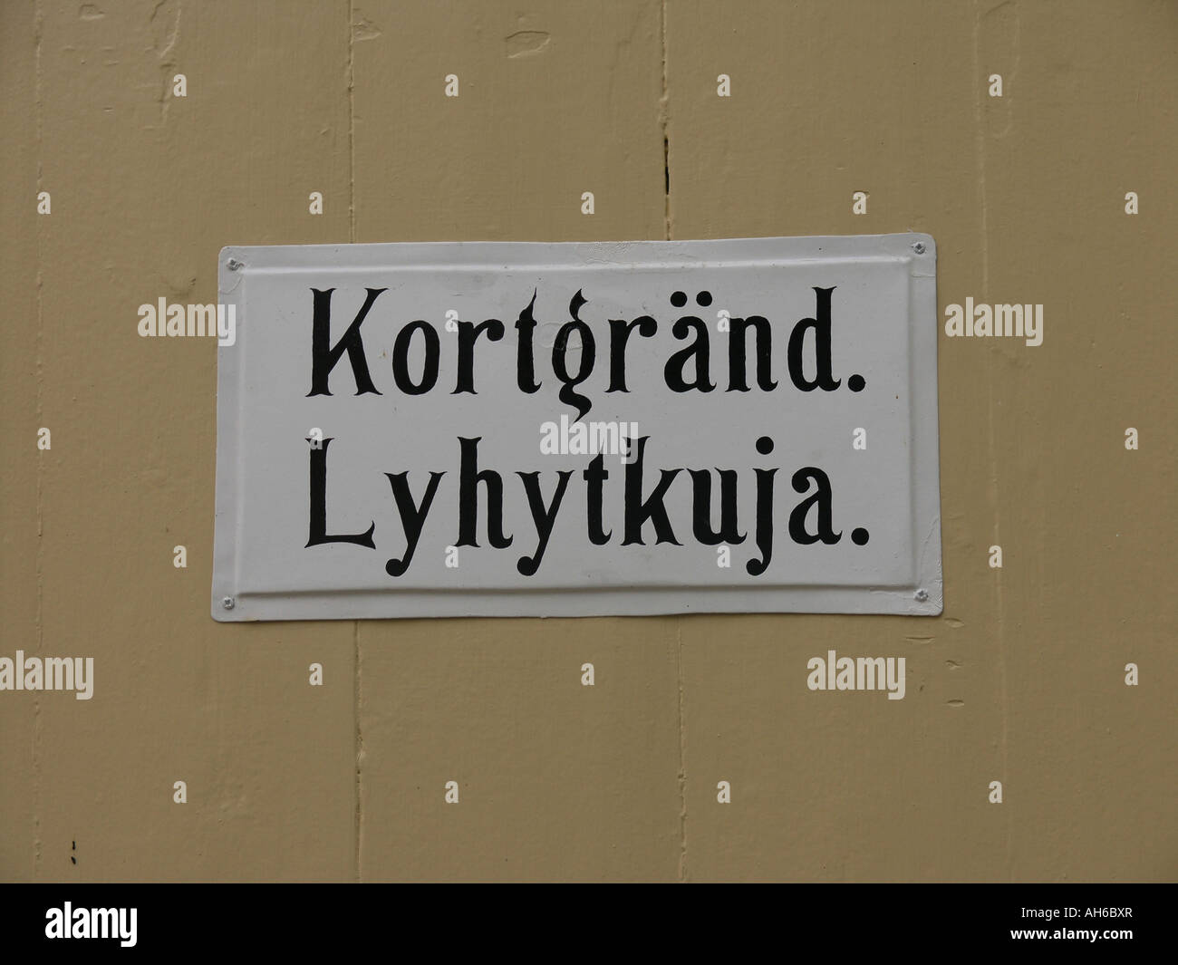 Città vecchia di Lovisa strada segno in finlandese e in svedese in Finlandia Foto Stock