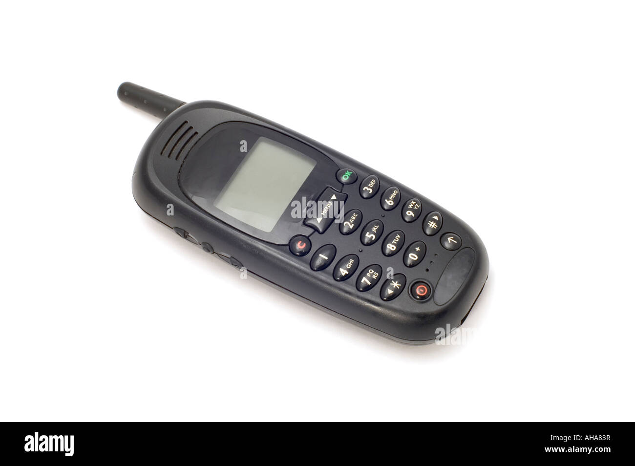 Oggetto di serie su bianco vecchio telefono cellulare Foto Stock