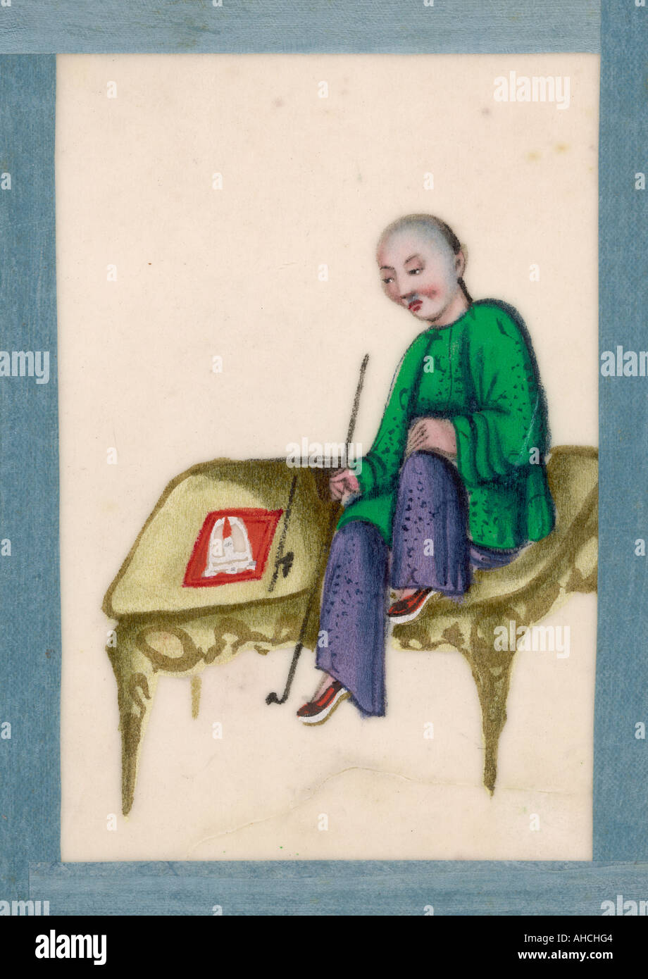 Un fumatore cinese Foto Stock