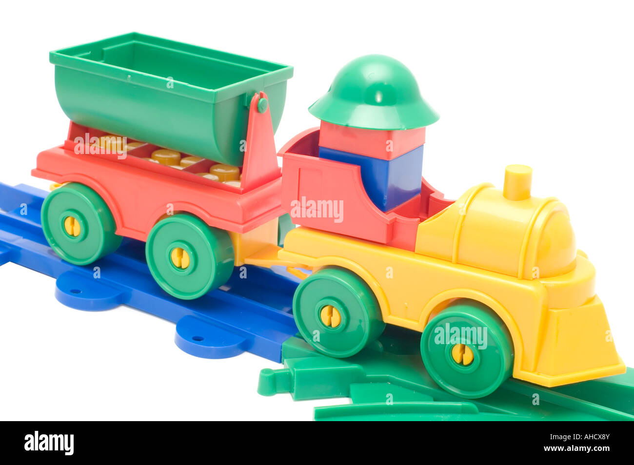 Oggetto di serie su bianco ferrovia giocattolo motore e linea di diramazione Foto Stock