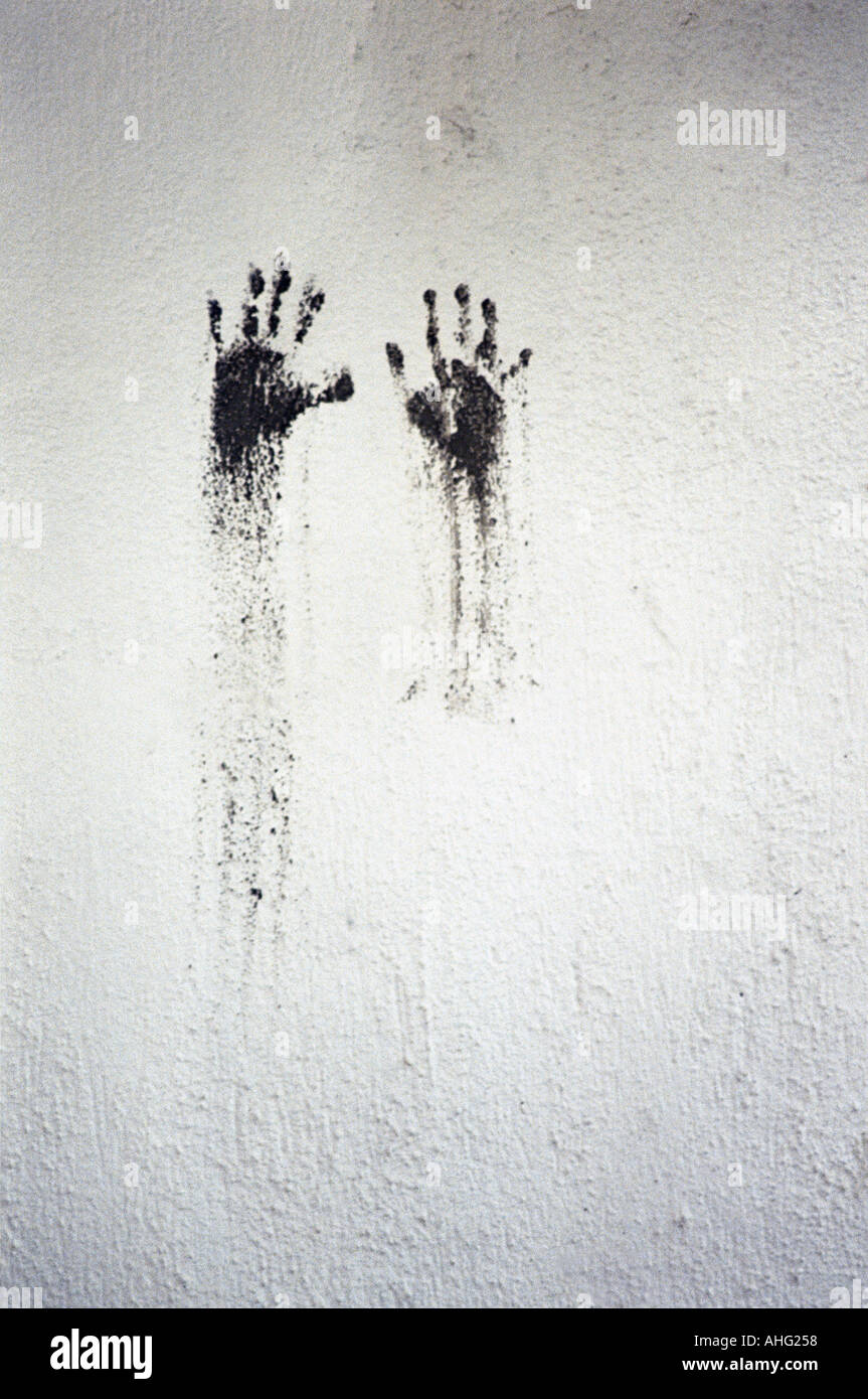 Stampe a mano cosparsa sulla parete Foto Stock