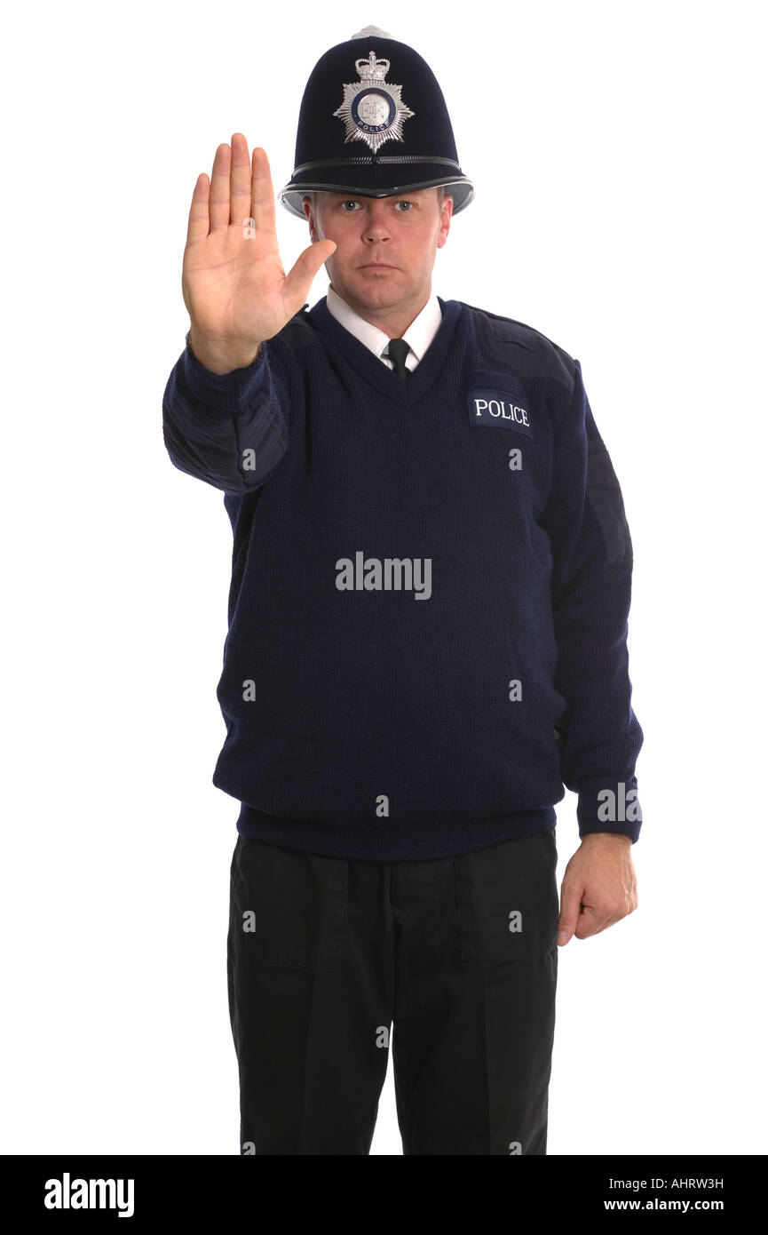 British police officer gesticolando per voi per interrompere Foto Stock