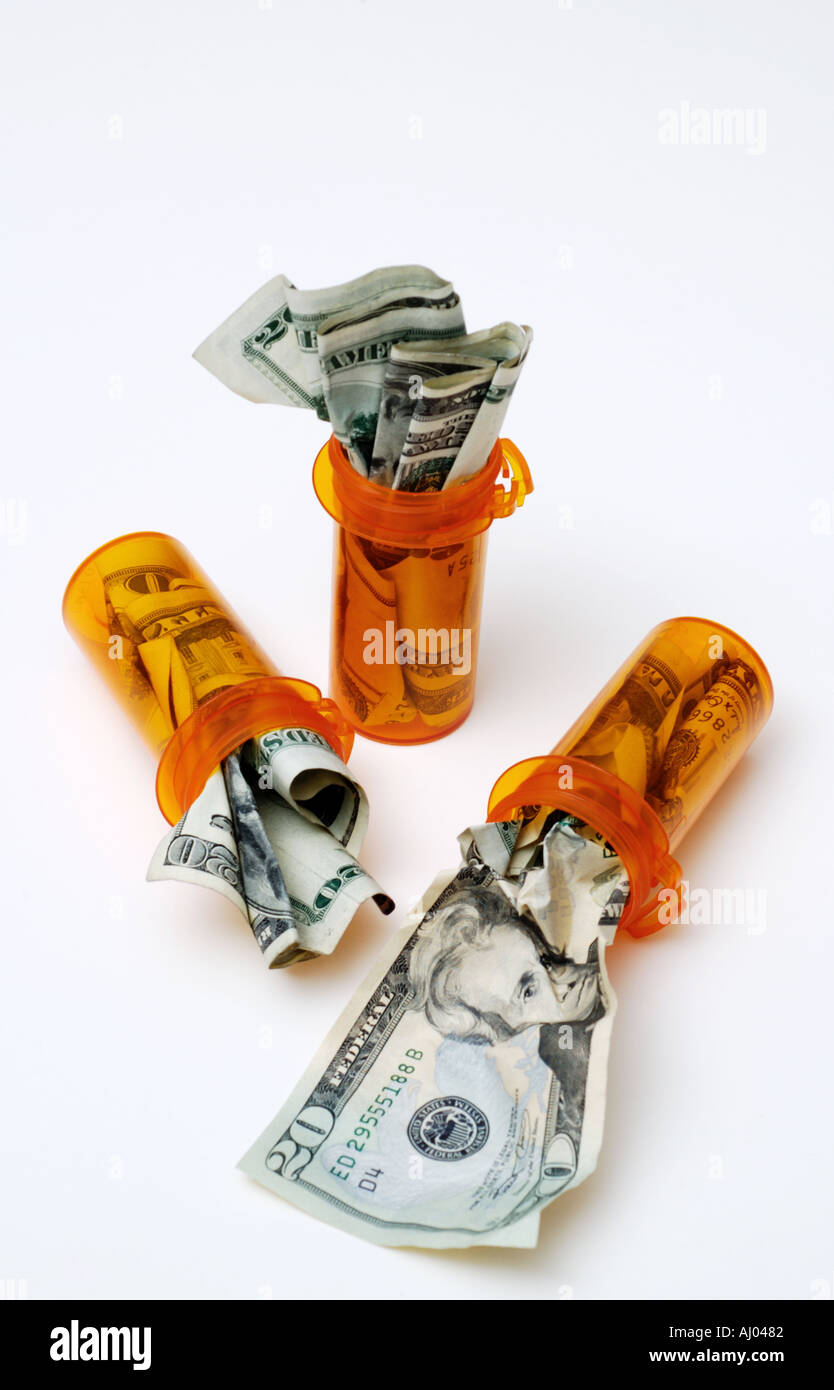 Pillola bottiglie ripiene di denaro Foto Stock