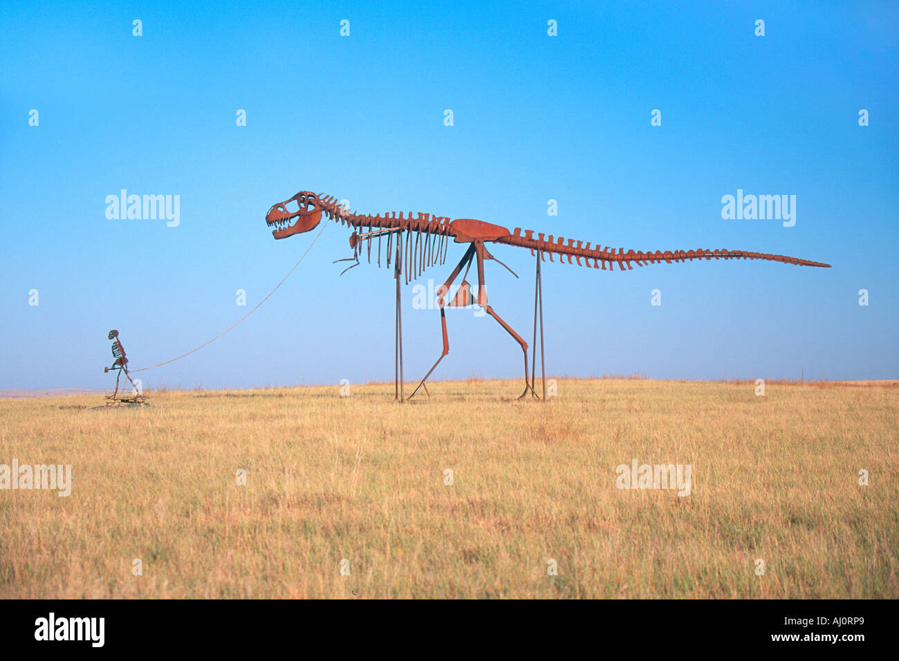 Scultura di metallo dinosauro attrazione stradale forcella piccione TN Foto Stock