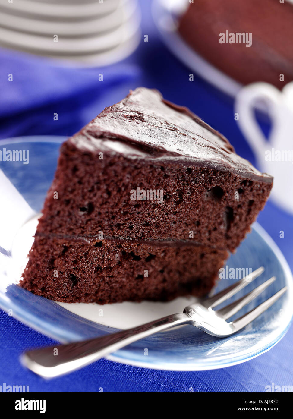 Una fetta di torta al cioccolato Foto Stock