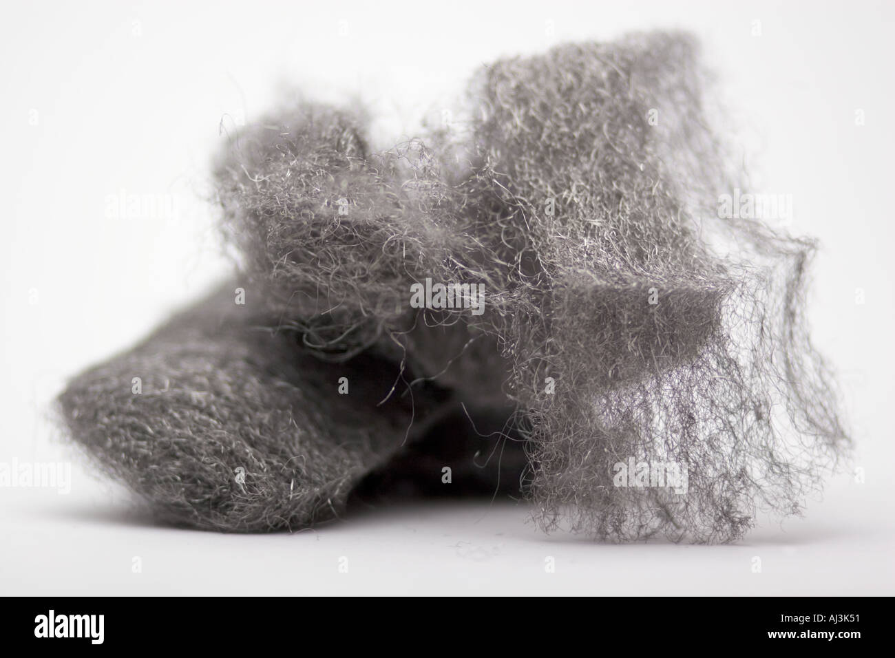 La lana di acciaio acciaio scrubbing pad tampone di lucidatura del legno scrubbing per lucidatura Foto Stock