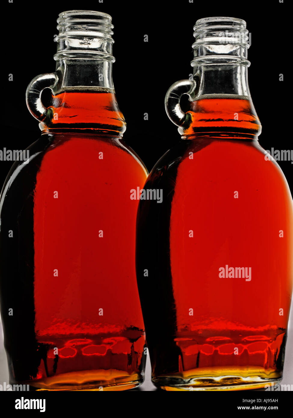 Bottiglie di sciroppo d'acero Foto Stock