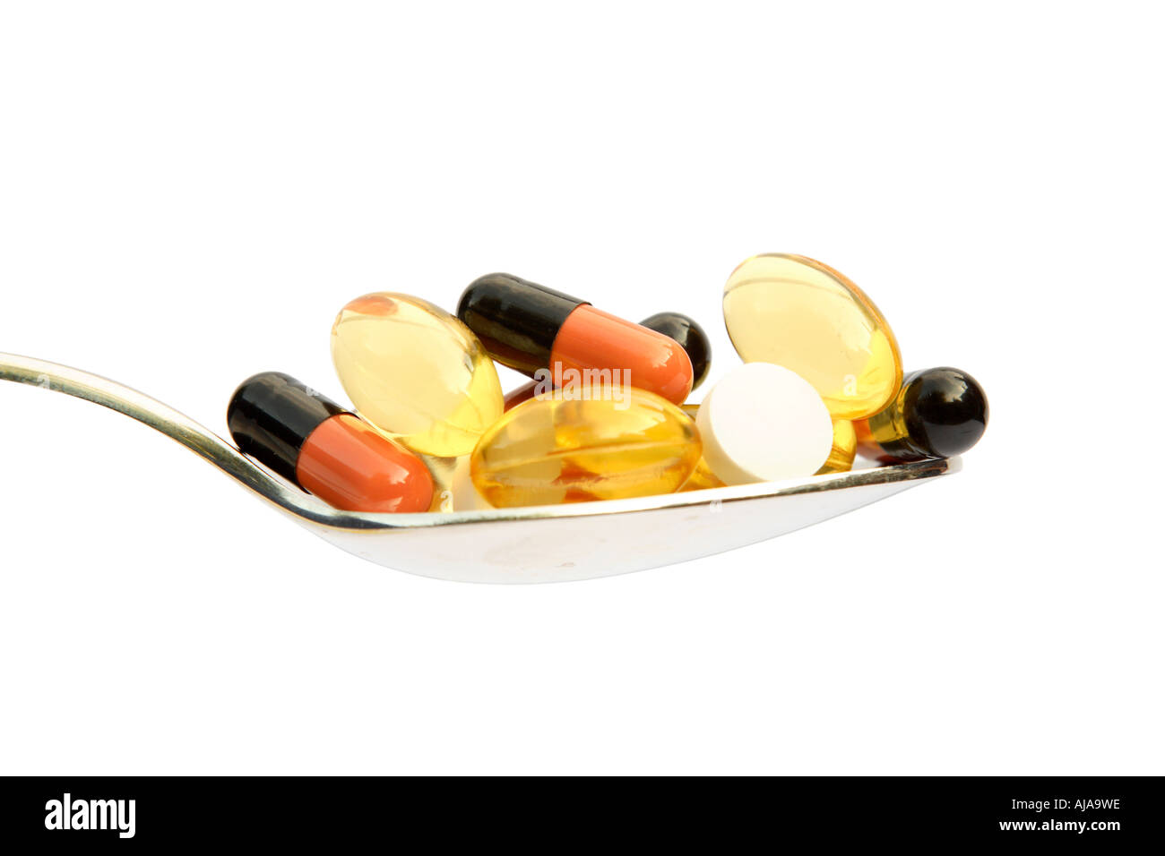 Cucchiaio di varie droghe isolato su bianco Foto Stock