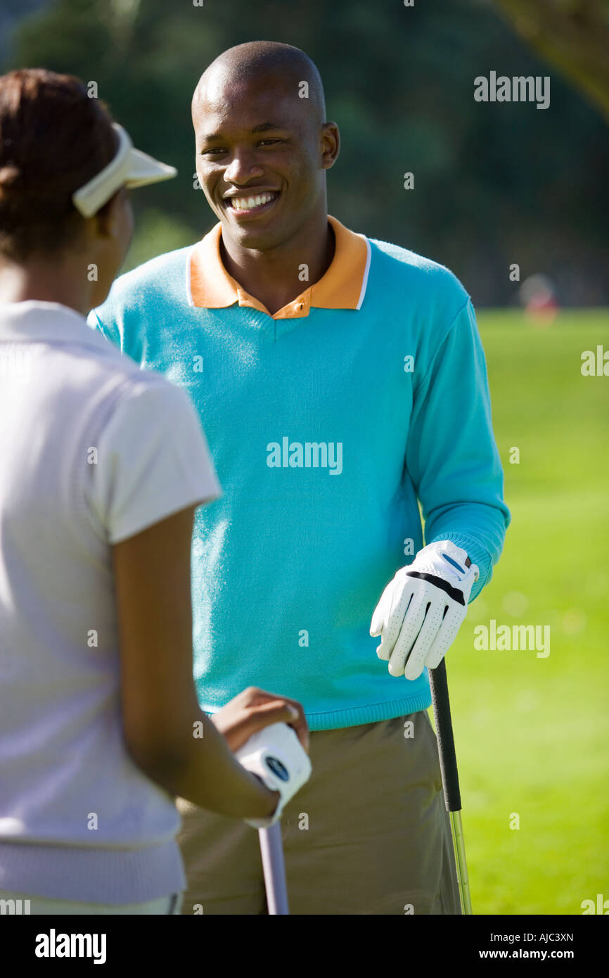 Gli amanti del golf avente Discusion, faccia a faccia Foto Stock