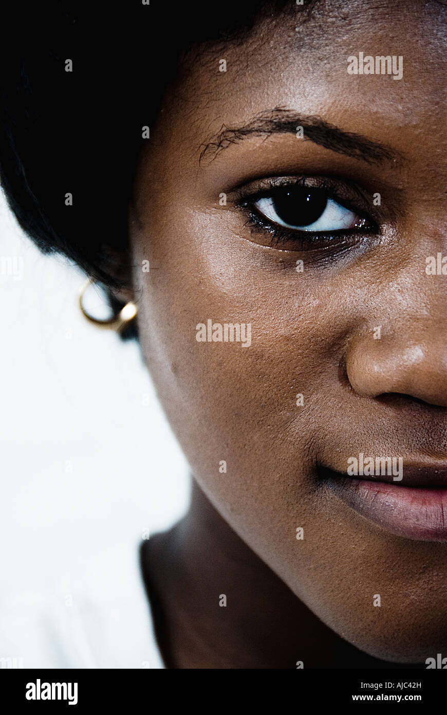 Un giovane ragazze faccia divisa a metà da fotografie telaio Foto Stock