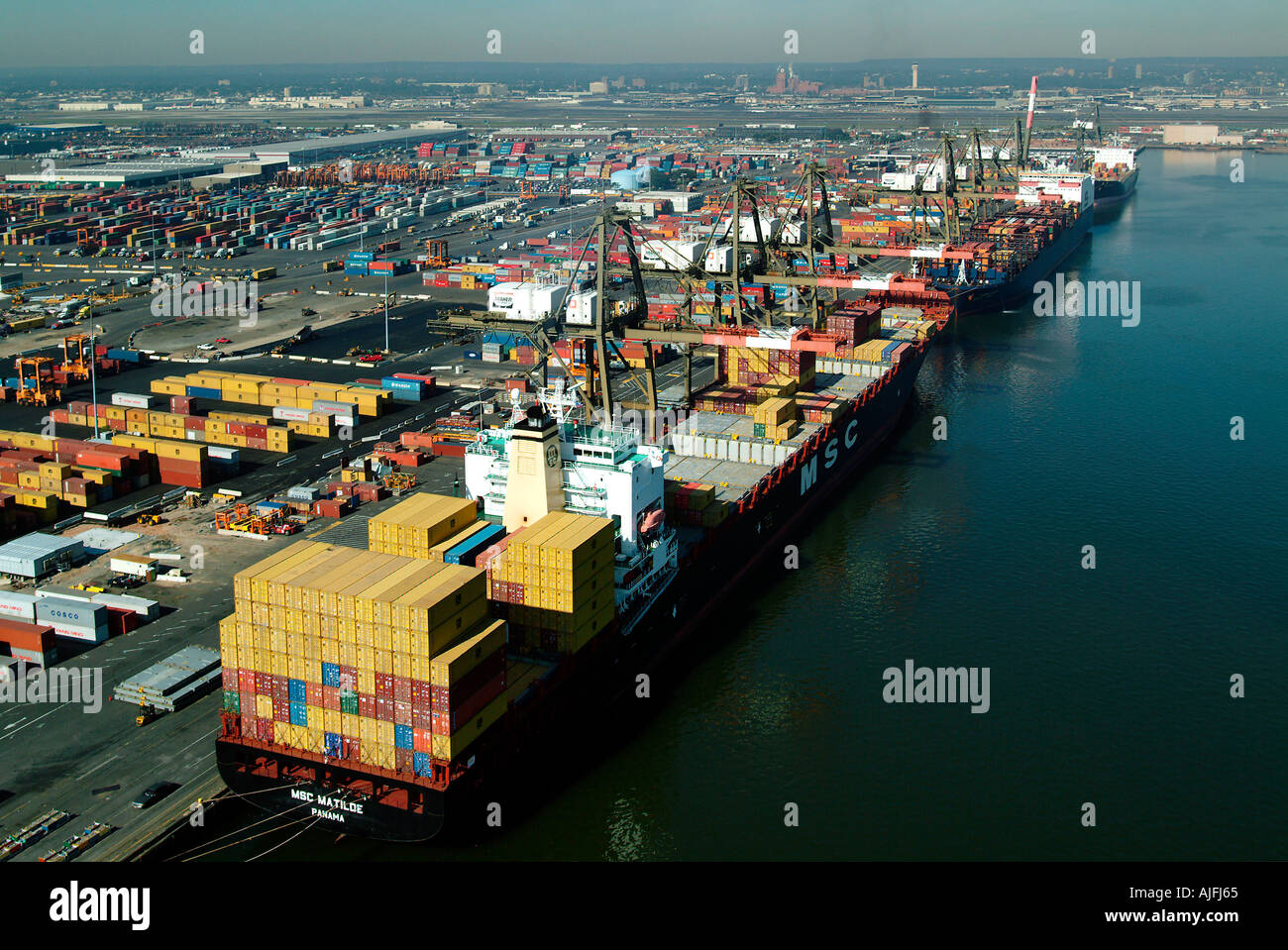 Carico Scarico Docks nave Container gru giganti Foto Stock