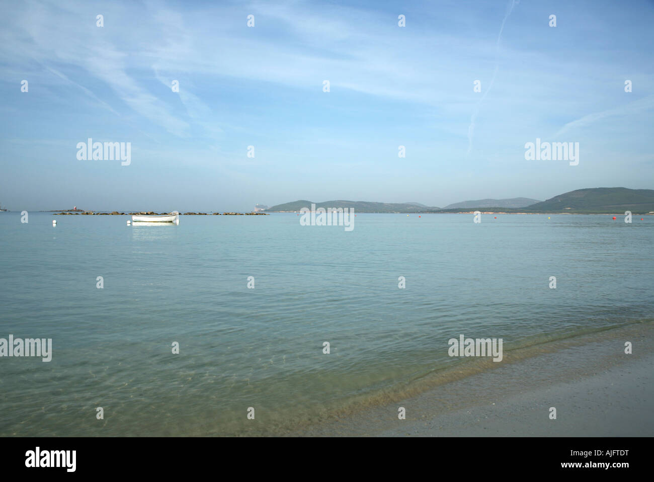 La mattina presto sulla spiaggia di Alghero, Sardegna, Italia Foto Stock