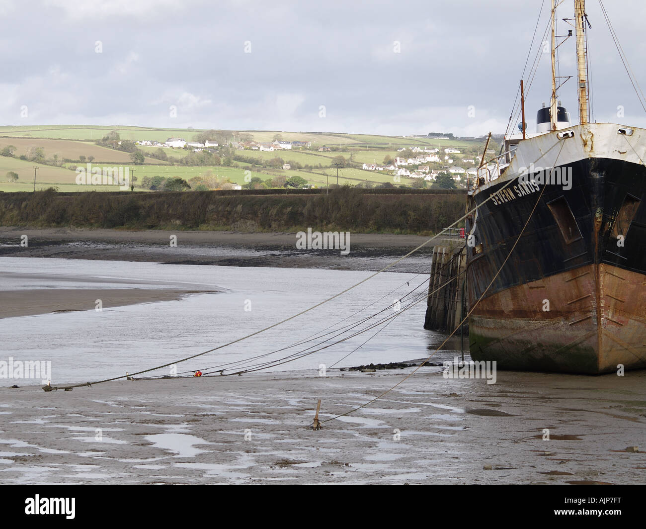 Severn draga sabbia sull'Estuario Taw a bassa marea Foto Stock