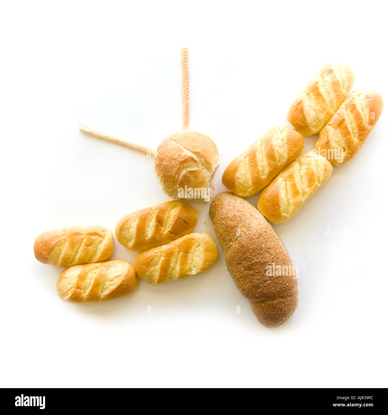 Composizione di differenti tipi di pane formando una farfalla Foto Stock