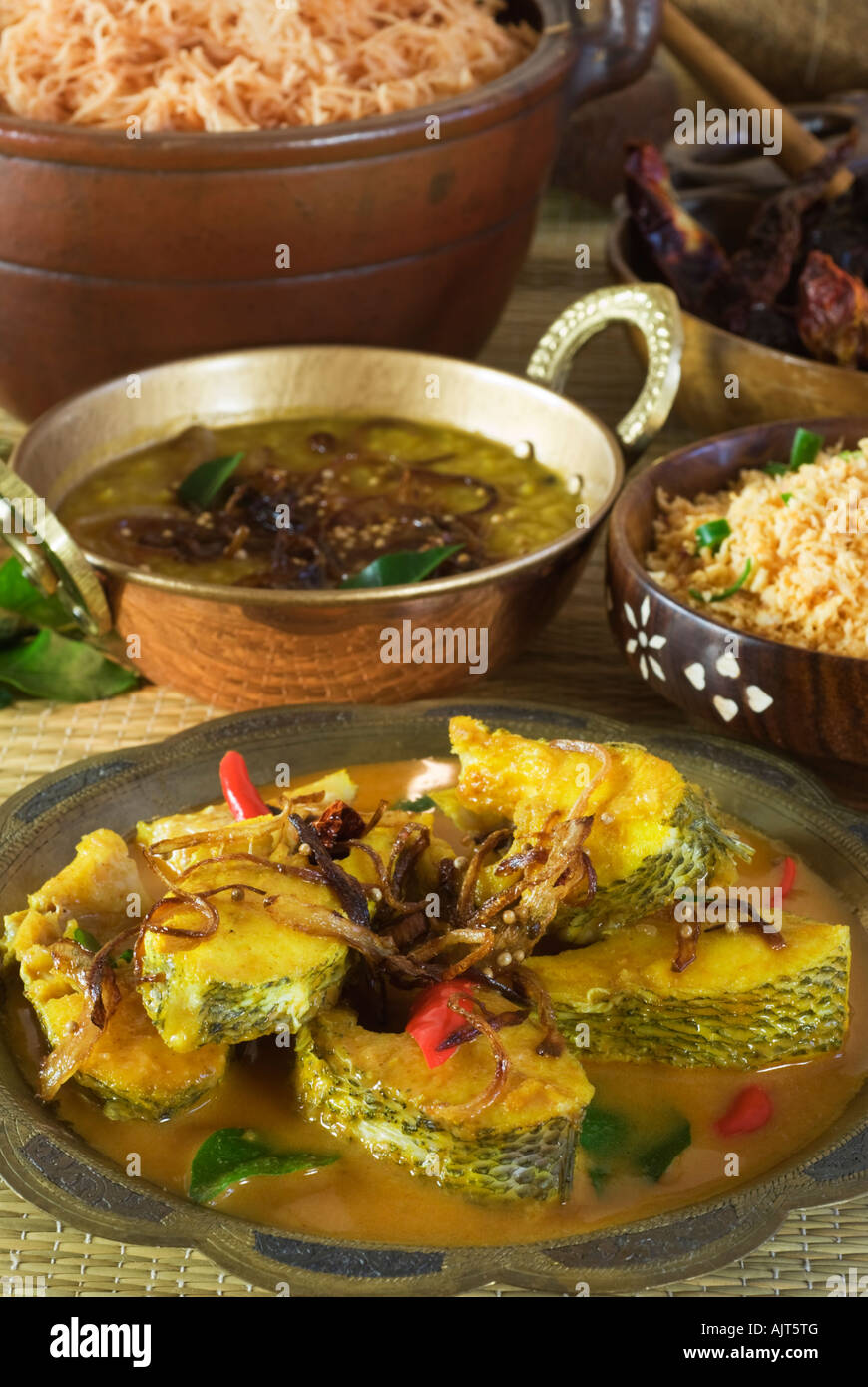 Pesce al curry con tramogge stringa Sri Lanka cibo Foto Stock