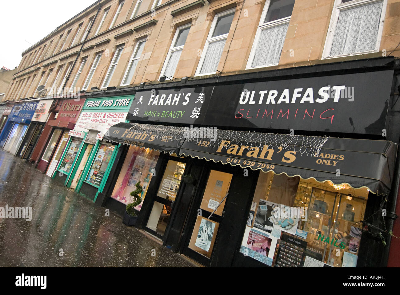 Pollokshields area dello shopping a Glasgow l'asiatico principale area per lo shopping di Glasgow Foto Stock