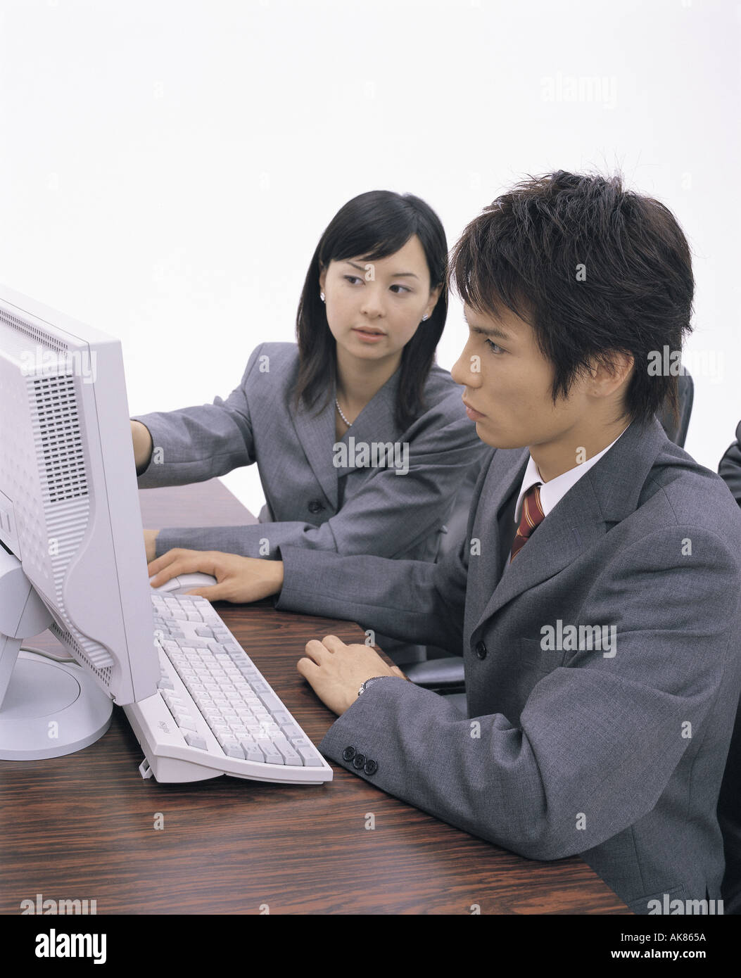 La gente di affari tramite il computer Foto Stock