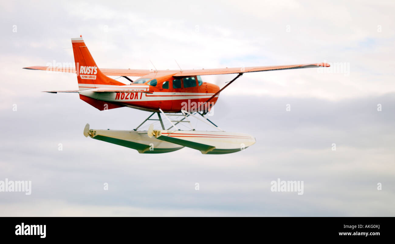 Ruggine Servizio di volo Cessna 206 battenti turista su un volo panoramico fuori di Anchorage in Alaska in estate Foto Stock