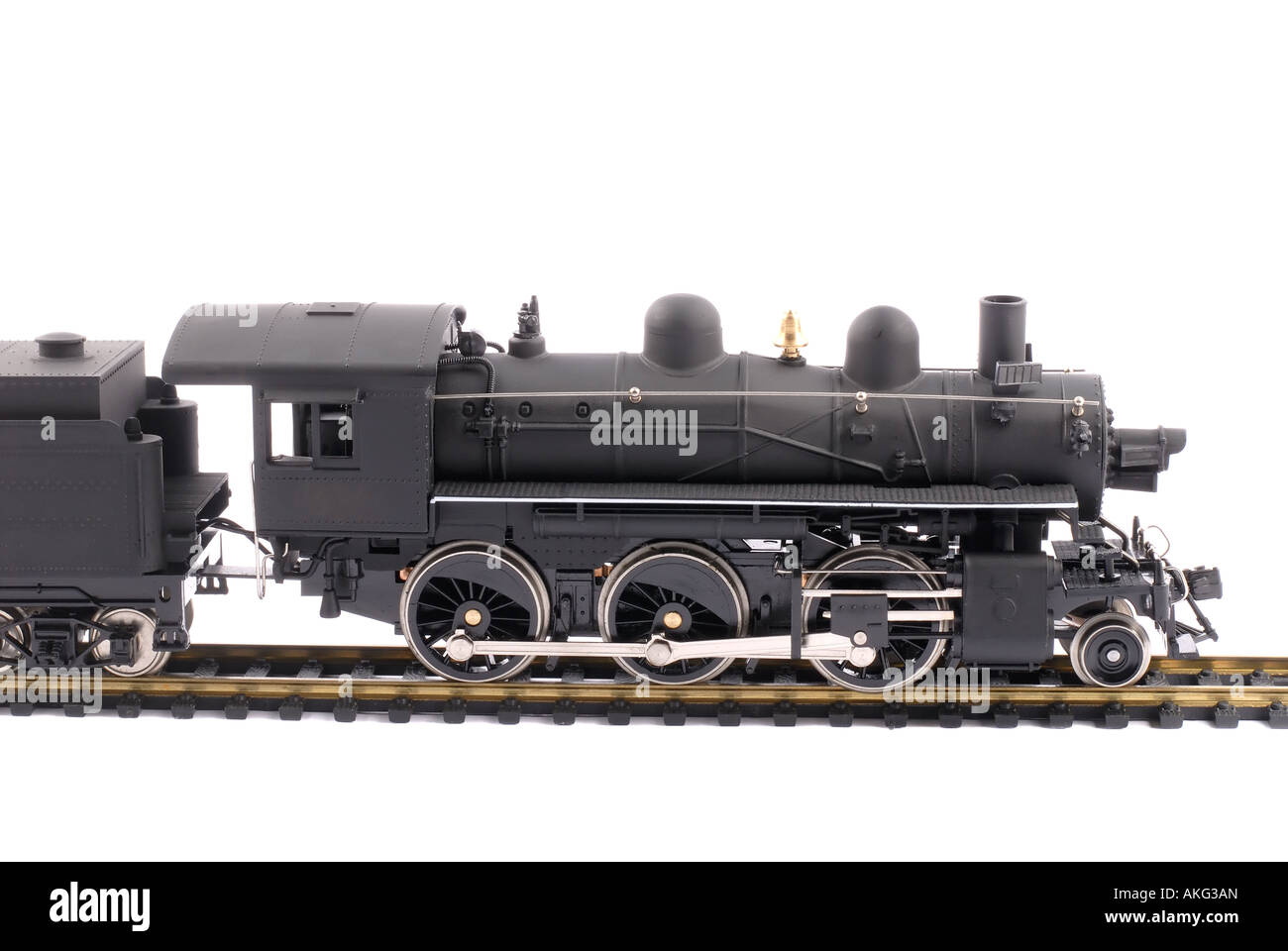 Modello di un vecchio treno a vapore isolato su bianco Foto Stock