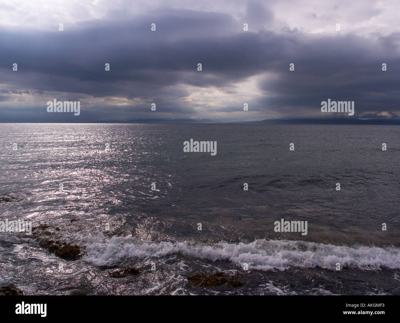 Suono di Jura verso Islay dalla Costa di Argyll Scozia Scotland Foto Stock