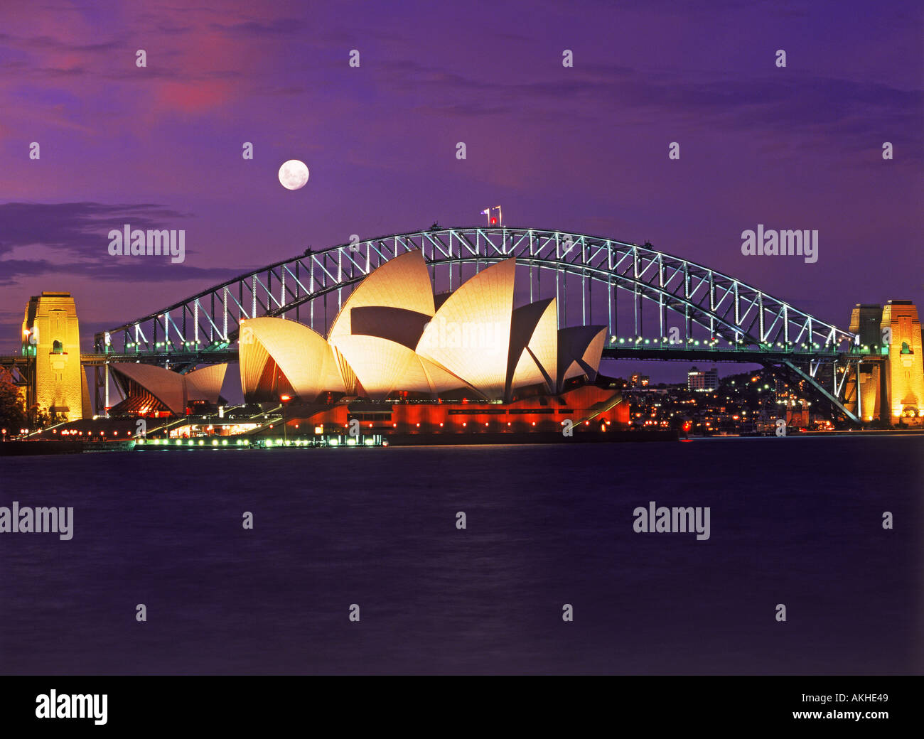 Sydney Harbour Bridge e Opera House al tramonto Foto Stock