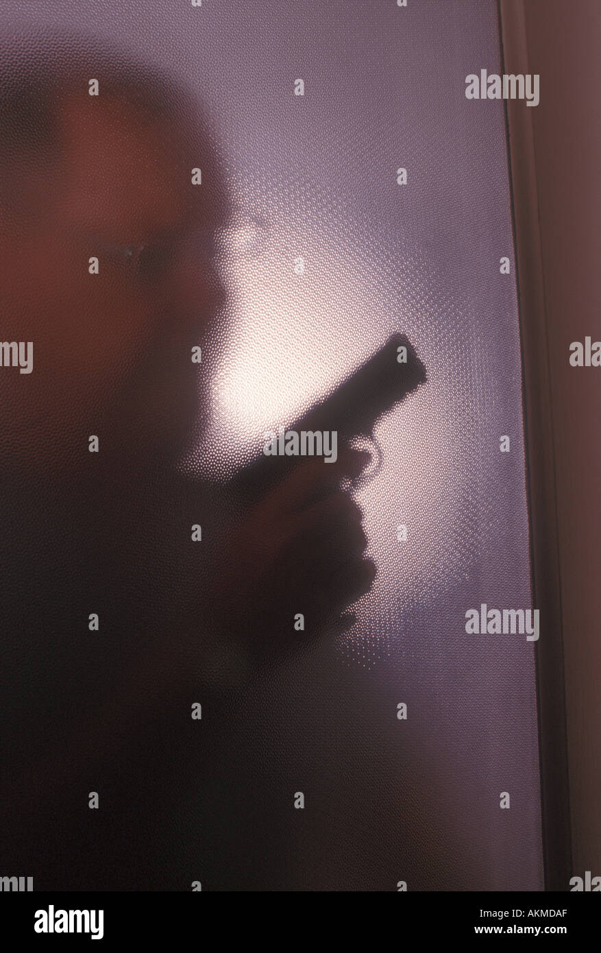 Uomo armato Foto Stock