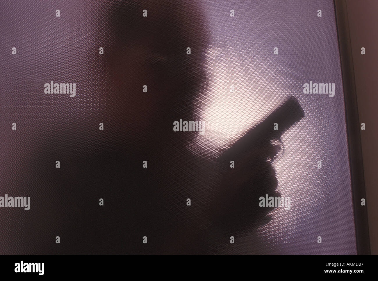 Uomo armato Foto Stock