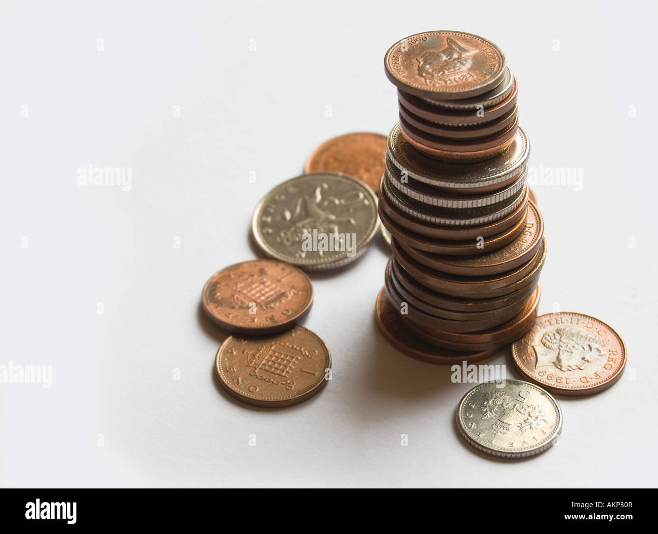 Pila di Sterling monete Foto Stock