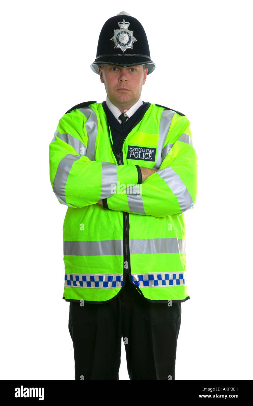 La metropolitan police officer in una alta visibilità camicia e indossa un custode tradizionale casco Foto Stock