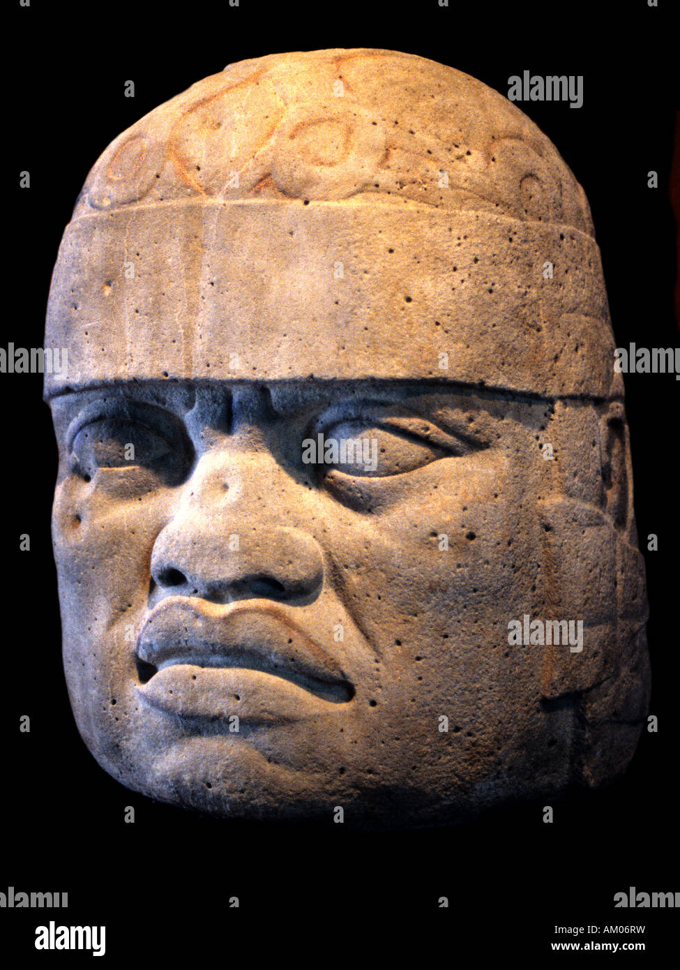 Scultura colossale testa Messico museo civiltà Maya Xipe Totec dio della molla Foto Stock