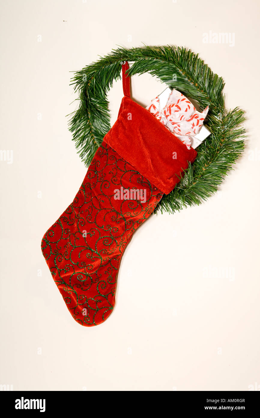 Calza di Natale pieno di regali Foto Stock