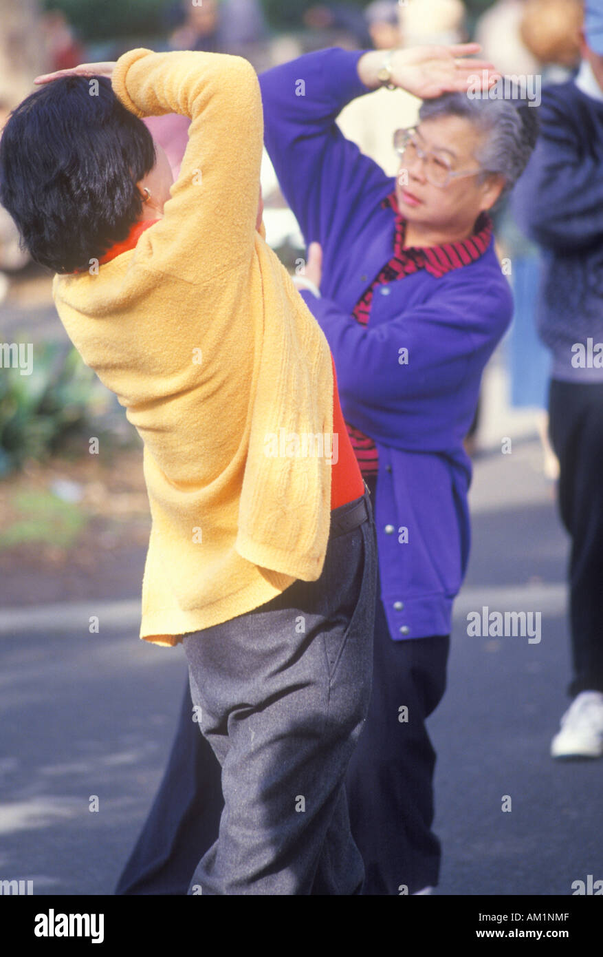 Gli americani cinesi praticare il Tai Chi North Beach può Francisco CA Foto Stock