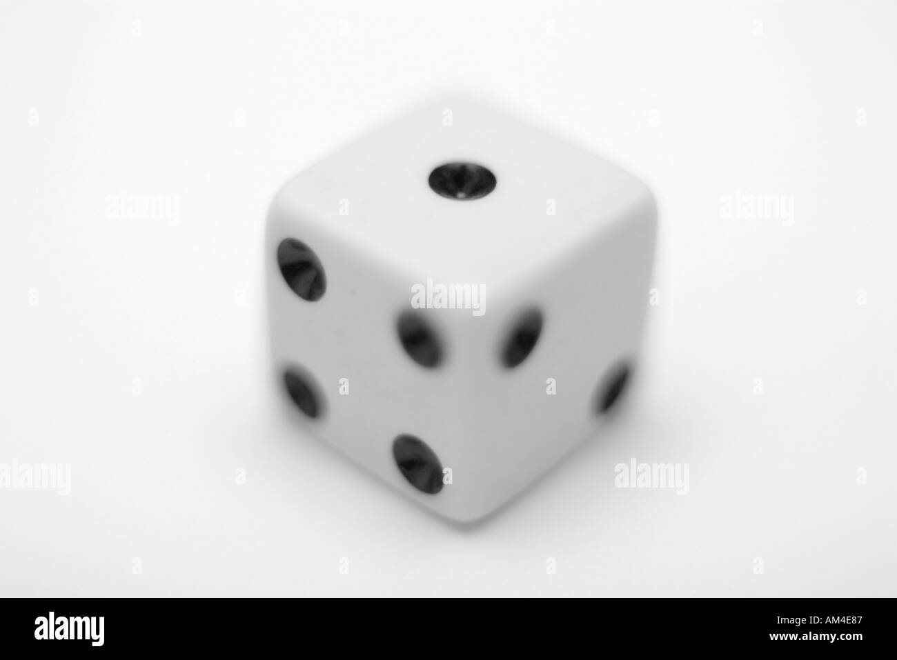 White dice che mostra il numero uno Foto Stock