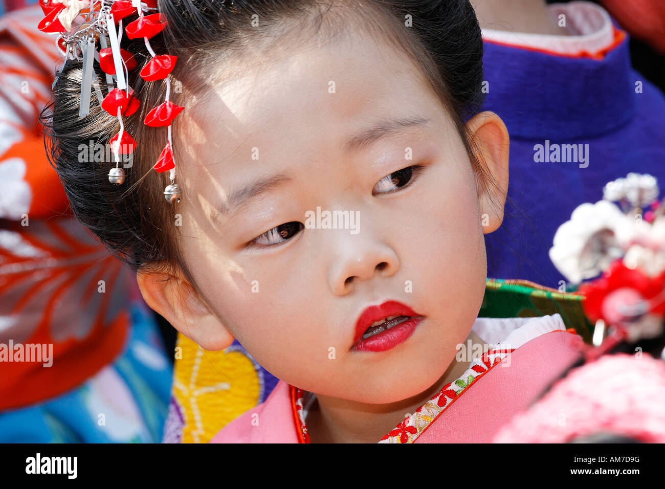 Piccola ragazza giapponese con in bocca, Giappone fiera, Duesseldorf, NRW, Germania Foto Stock