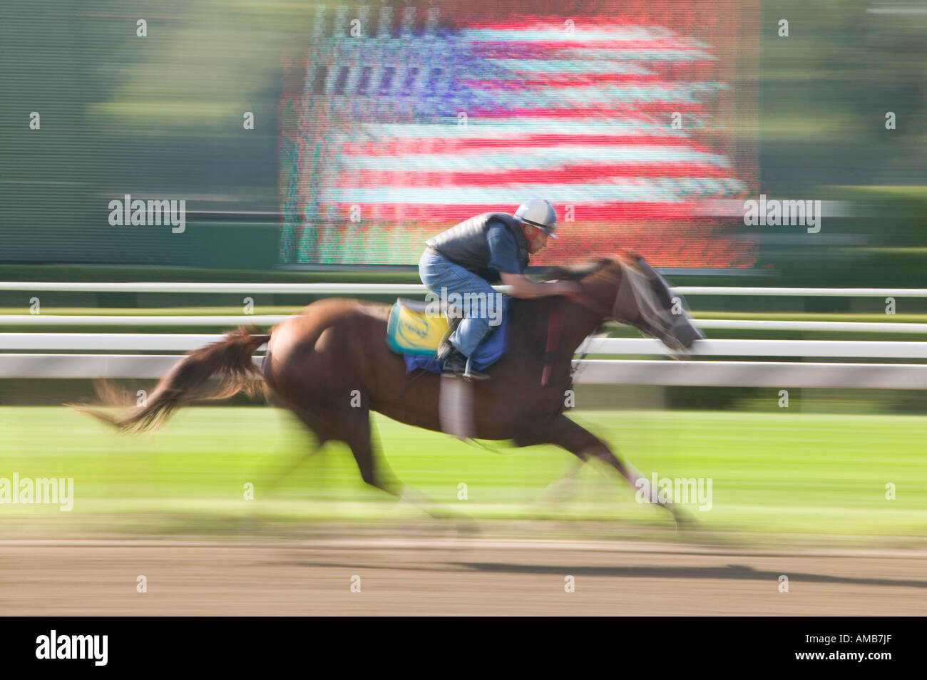 Pratica fantino e cavallo galop intorno alla principale via a Saratoga Springs STATI UNITI D'AMERICA AGOSTO 2006 Foto Stock