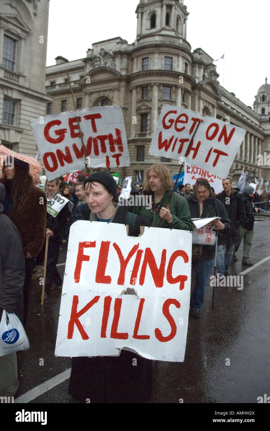 Flying uccide i manifestanti cartelloni il cambiamento climatico marzo Londra 8 Dicembre 2007 Foto Stock