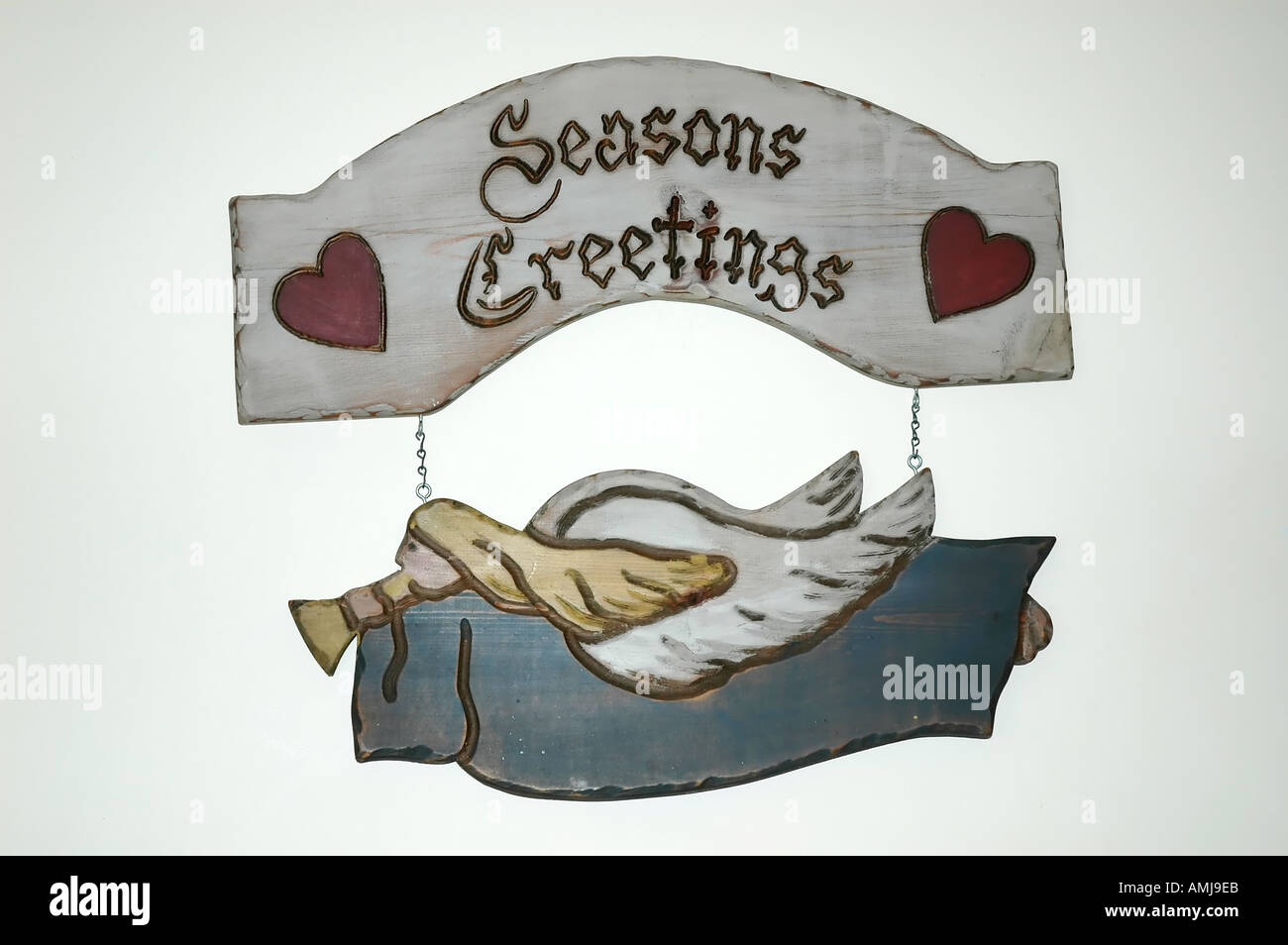 Natale in legno placca angelo appeso un cartello con i migliori auguri di Buon Natale Foto Stock