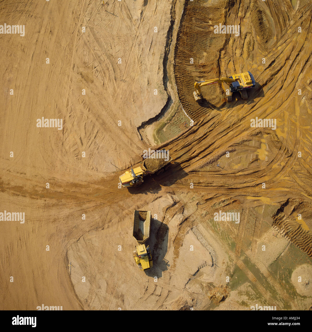 Tettuccio di Vista aerea degli escavatori al lavoro Foto Stock