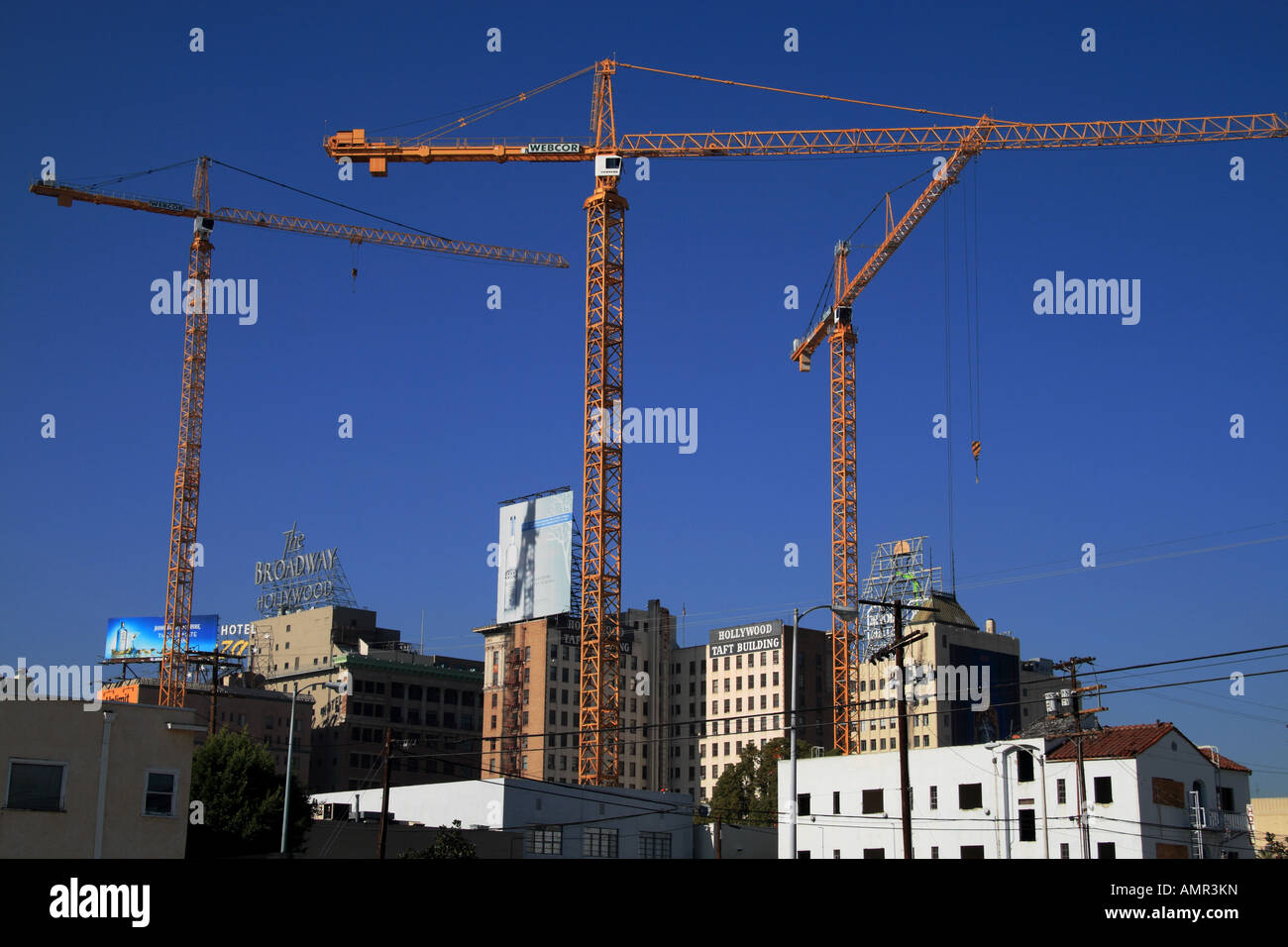 Tre giganteschi gru edili Foto Stock