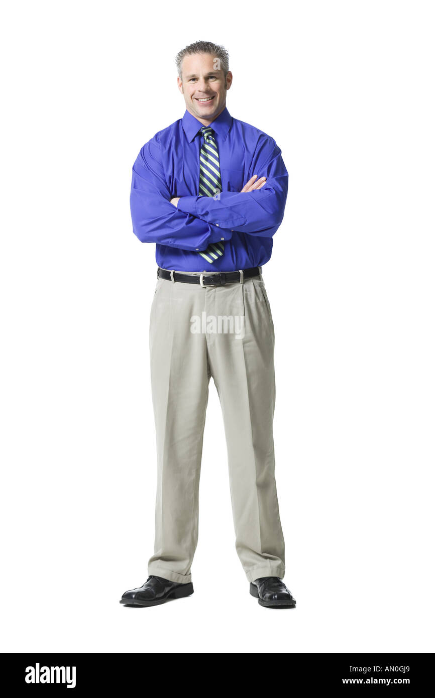 Ritratto di un imprenditore in piedi con le braccia piegate Foto Stock