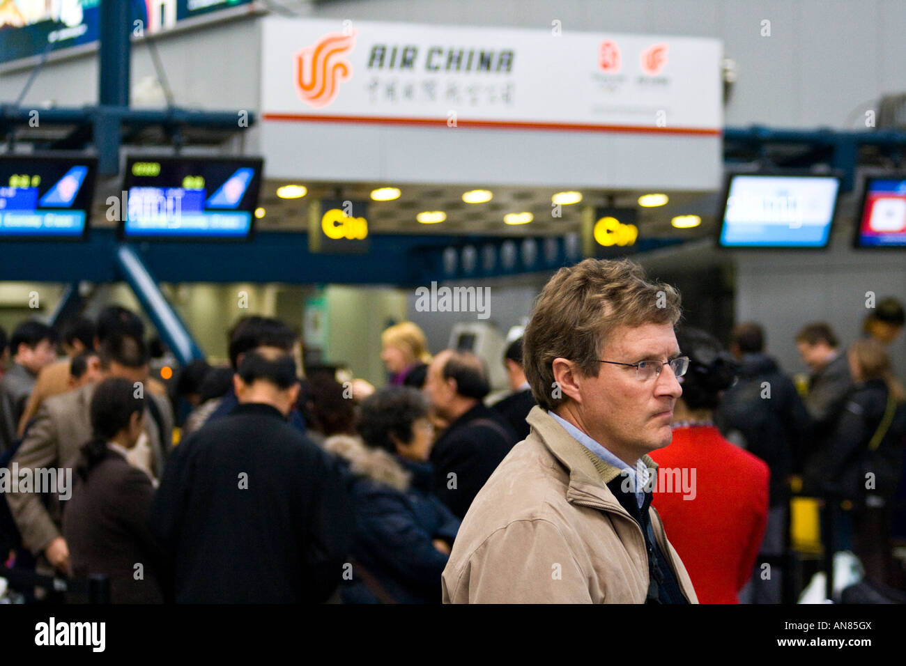Air China sportello check in e BJS PEK all'Aeroporto Internazionale Capital di Pechino CINA Foto Stock