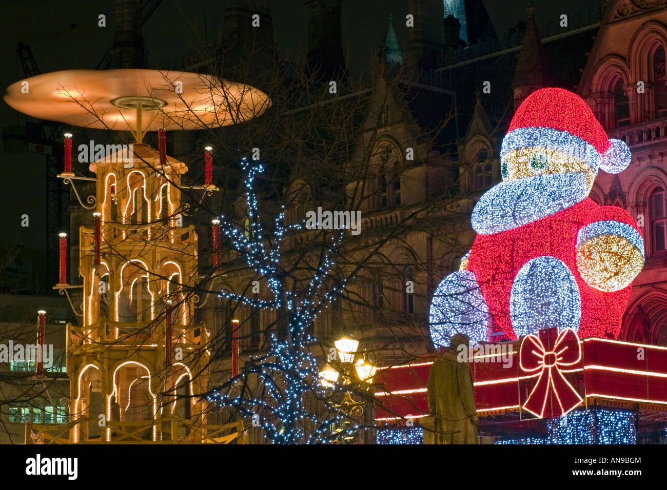 Le luci di Natale e la festa di mercato in piazza Albert Manchester Foto Stock