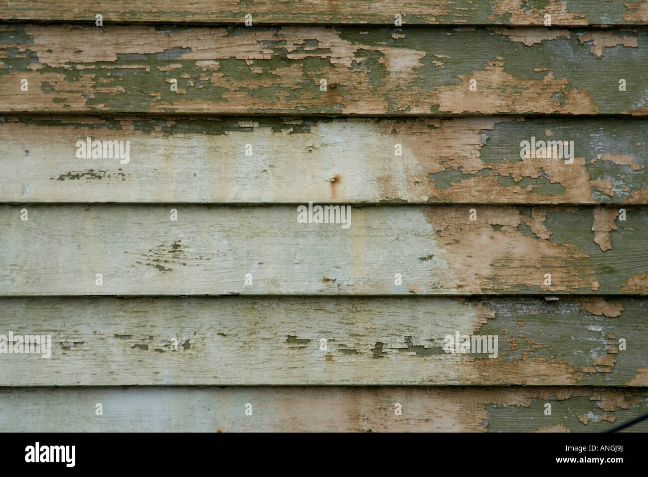 Sbiadita schierandosi in legno Foto Stock