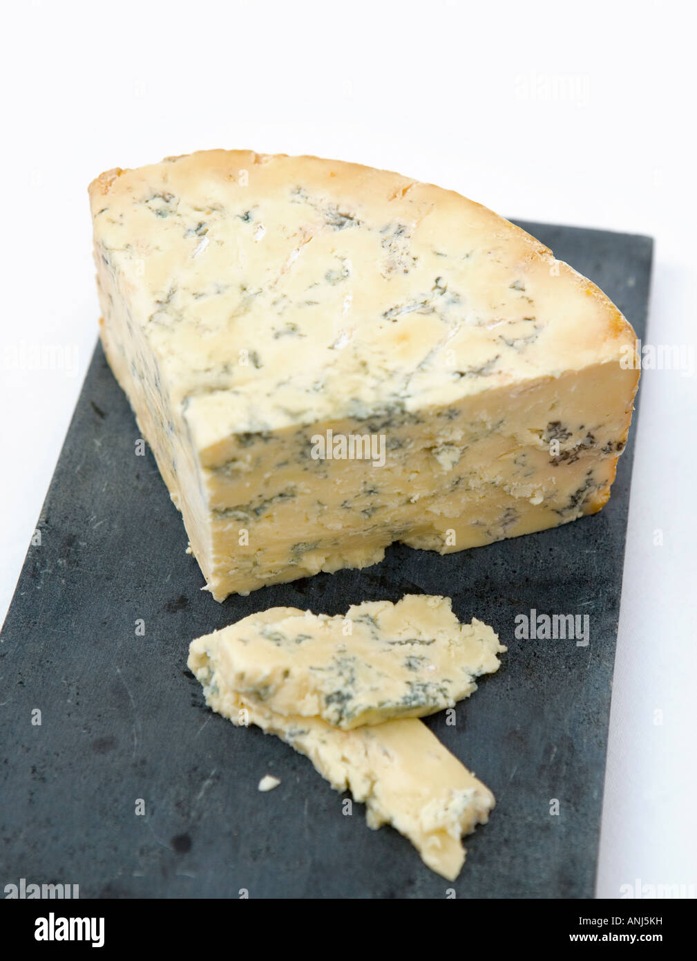 Del formaggio Stilton su formaggi di ardesia Foto Stock