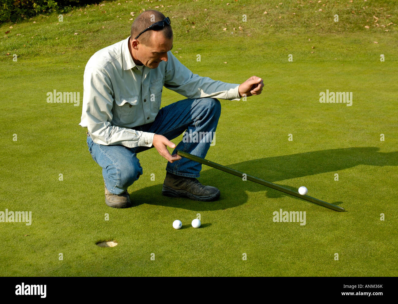 Head Green Keeper velocità della prova di verde sul campo da golf. Foto Stock