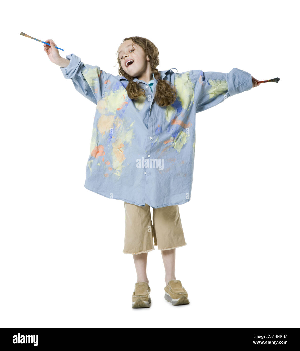 Ritratto di una ragazza con due pennelli Foto Stock