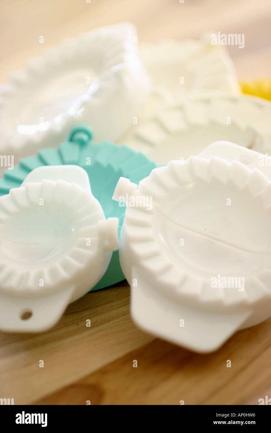 Canederlo di pressa utilizzata in Asia e in Europa orientale per fare degli gnocchi Foto Stock